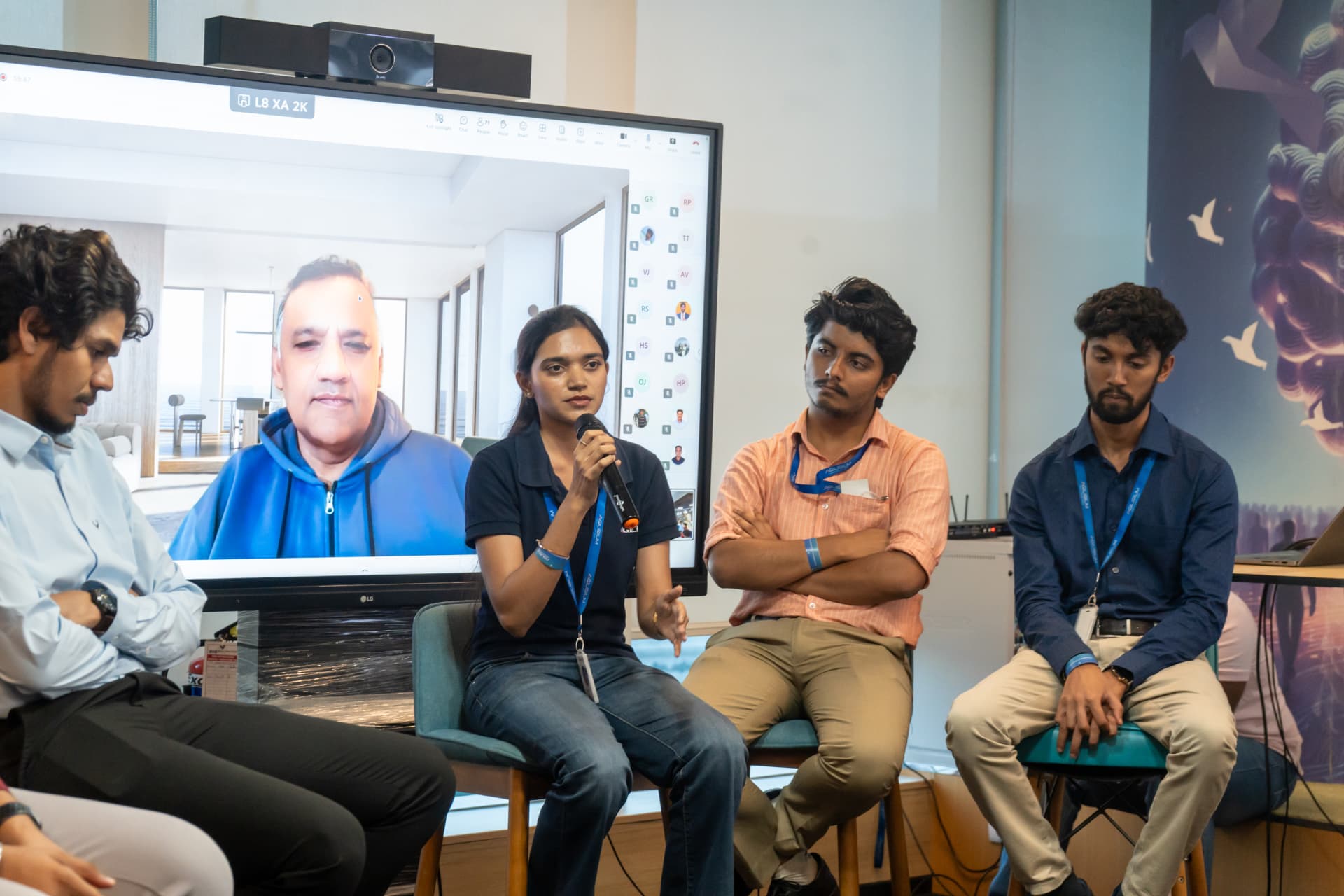 Panel of FDX participants sharing their experience with a remote leader on screen