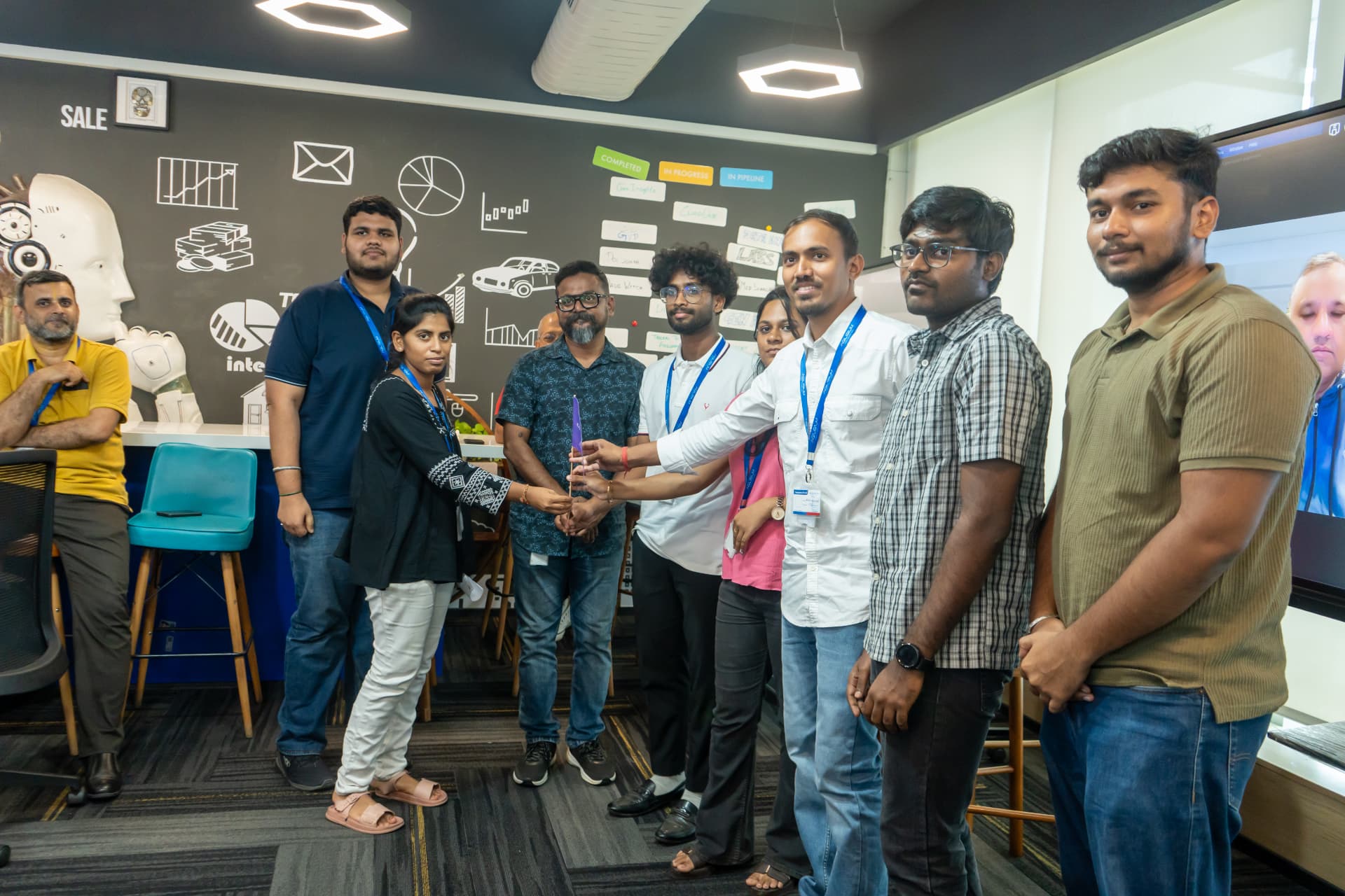 Team receiving a flag during an FDXe Sandhai activity